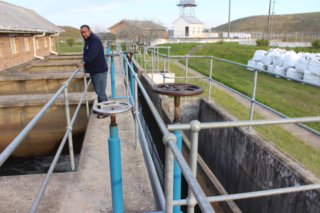 Amatola Water's Chris Nair looks over the final stages of the water treatment at the Waainek plant at the end of Mountain Drive. Pic: Emily Corke.  